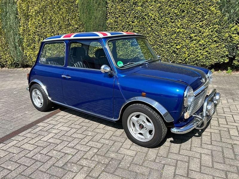 Second-hand Mini 1300 61 CP (44 kW) 1991 Albastru Hatchback