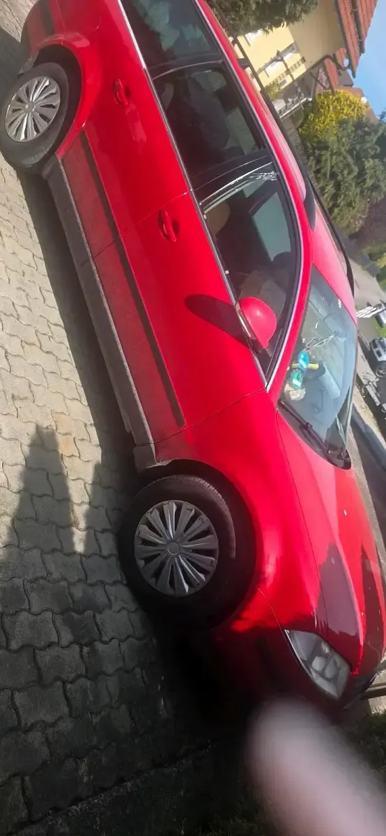 Second-hand VW Passat 130 CP (95 kW) 2004 Roșu Break