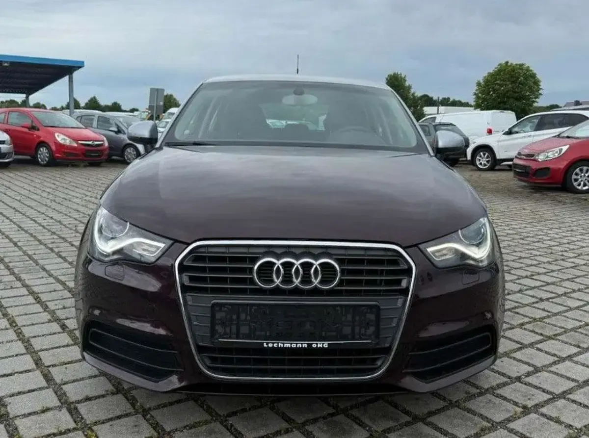 Gebraucht Audi A1 Sportback Sport 86 PS (63 kW) 2014 Shirazrot / florettsilber Kleinwagen