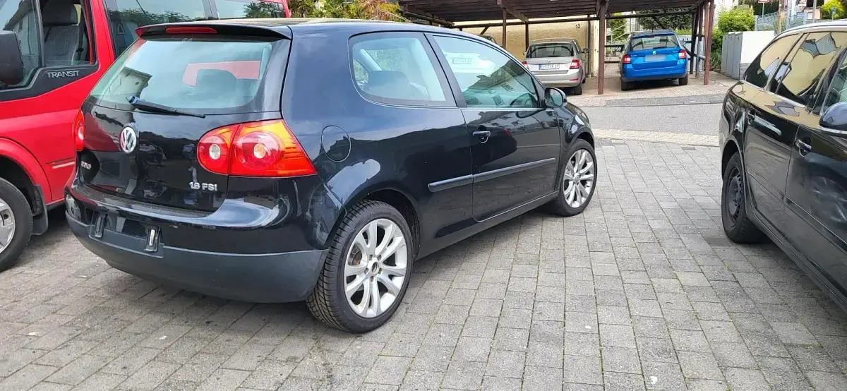 Używany VW Golf V 101 KM (74 kW) 2005 Czarny Hatchback