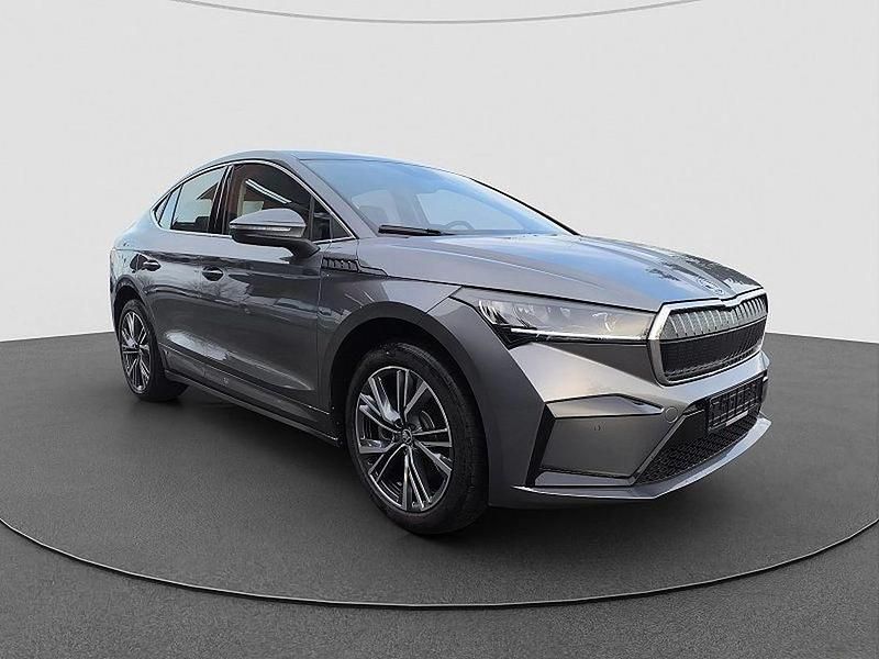 Grau Gebraucht 2024 Skoda Enyaq iV SUV | 47.849 € (Fairer Preis) - Bild 1/4