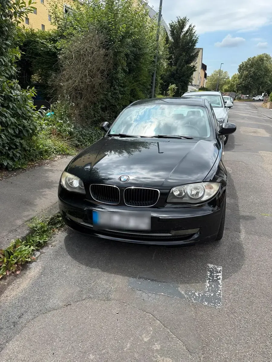 Gebraucht BMW 116 122 PS (89 kW) 2010 Schwarz Kleinwagen