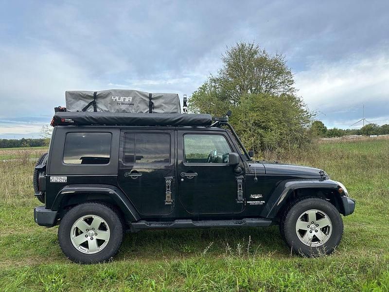 Schwarz Gebraucht 2010 Jeep Wrangler Sahara SUV | 42.999 € - Bild 1/4