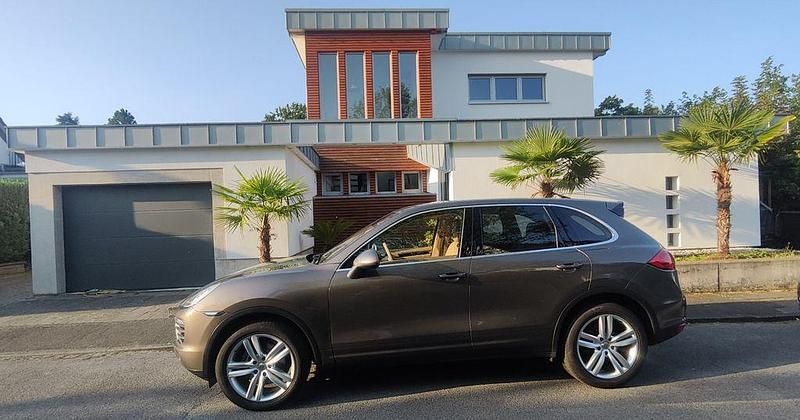 Braun Gebraucht 2012 Porsche Cayenne SUV | 22.950 € (Fairer Preis) - Bild 1/4
