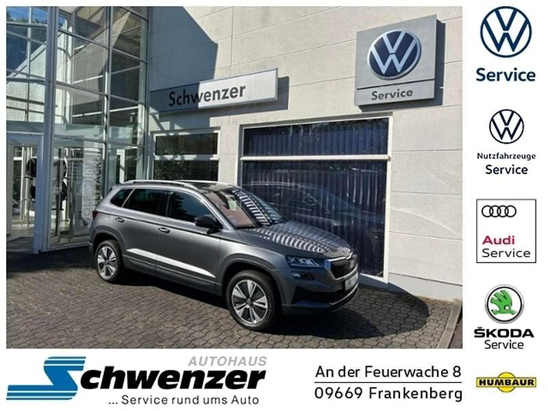 Graphitegrau metallic Gebraucht 2024 Skoda Karoq Style SUV | 32.549 € (Fairer Preis) - Bild 1/4