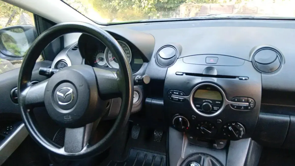 Gebraucht Mazda 2 86 PS (63 kW) 2009 Grün Kleinwagen