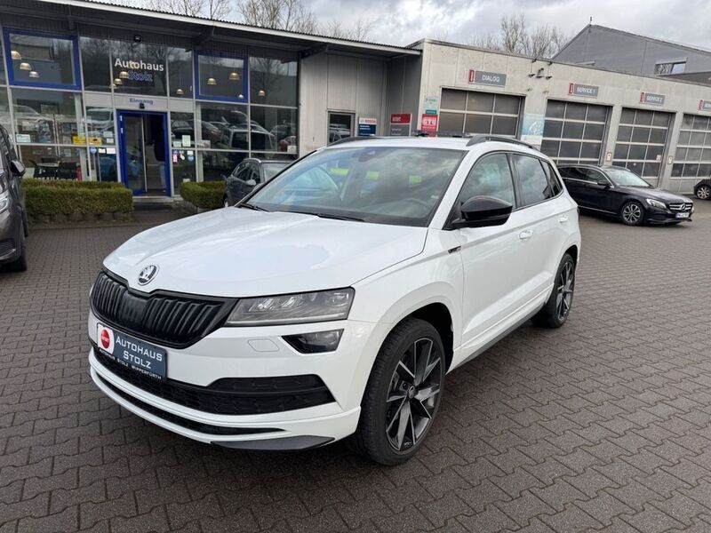 Weiß Gebraucht 2021 Skoda Karoq SportLine SUV | 24.393 € (Guter Preis) - Bild 1/4