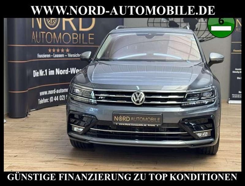Platinum grey metallic (metallic) Gebraucht 2020 VW Tiguan Allspace R-line SUV | 31.800 € (Fairer Preis) - Bild 1/3