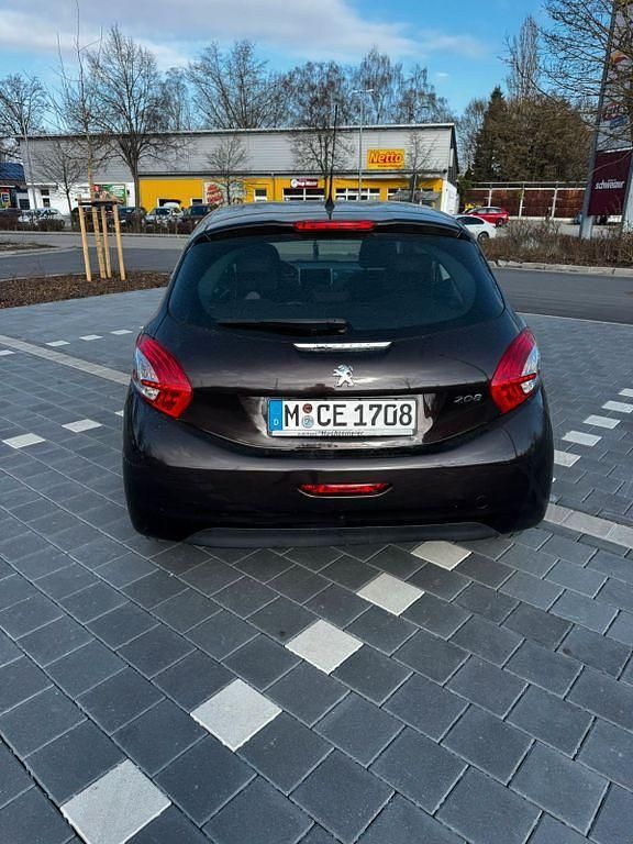 Gebraucht Peugeot 208 Access 68 PS (50 kW) 2013 Braun Kleinwagen