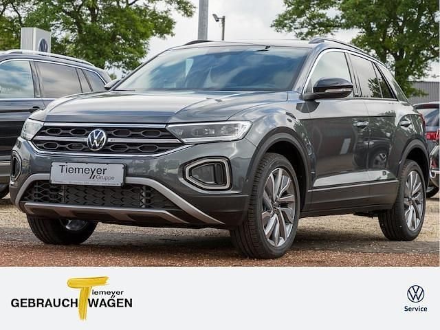 Grau Gebraucht 2024 VW T-Roc Move SUV | 28.220 € (Guter Preis) - Bild 1/4