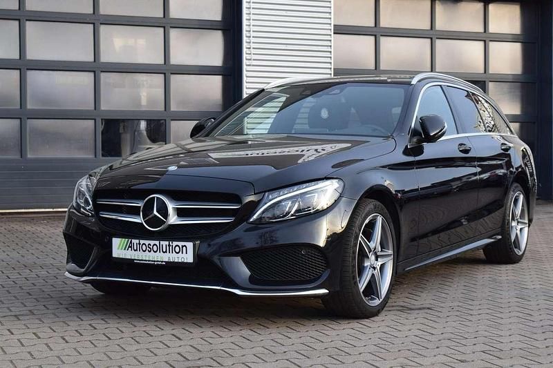 Gebraucht Mercedes C200 AMG line 184 PS (135 kW) 2016 Obsidianschwarz  metalliclack Kombi