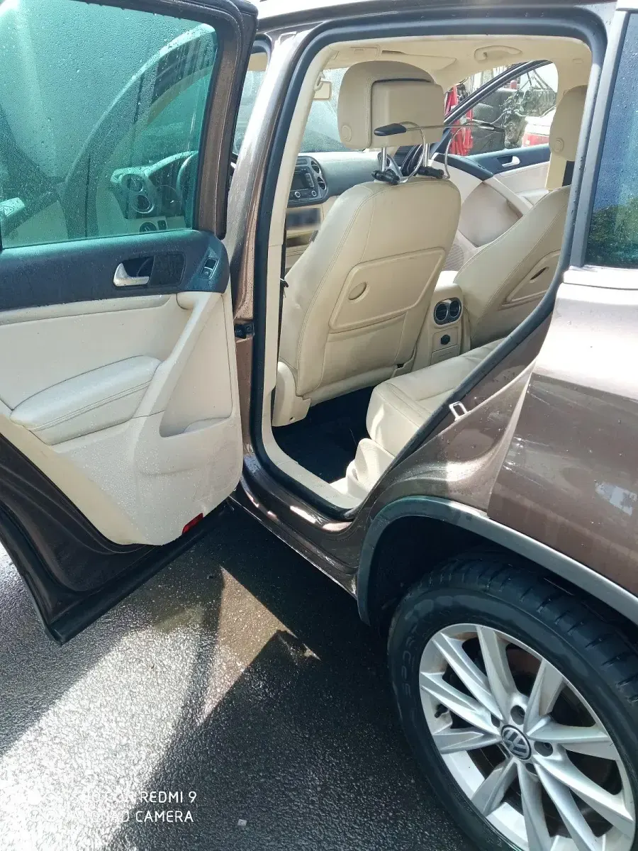 Używany VW Tiguan 179 KM (131 kW) 2012 Brązowy SUV