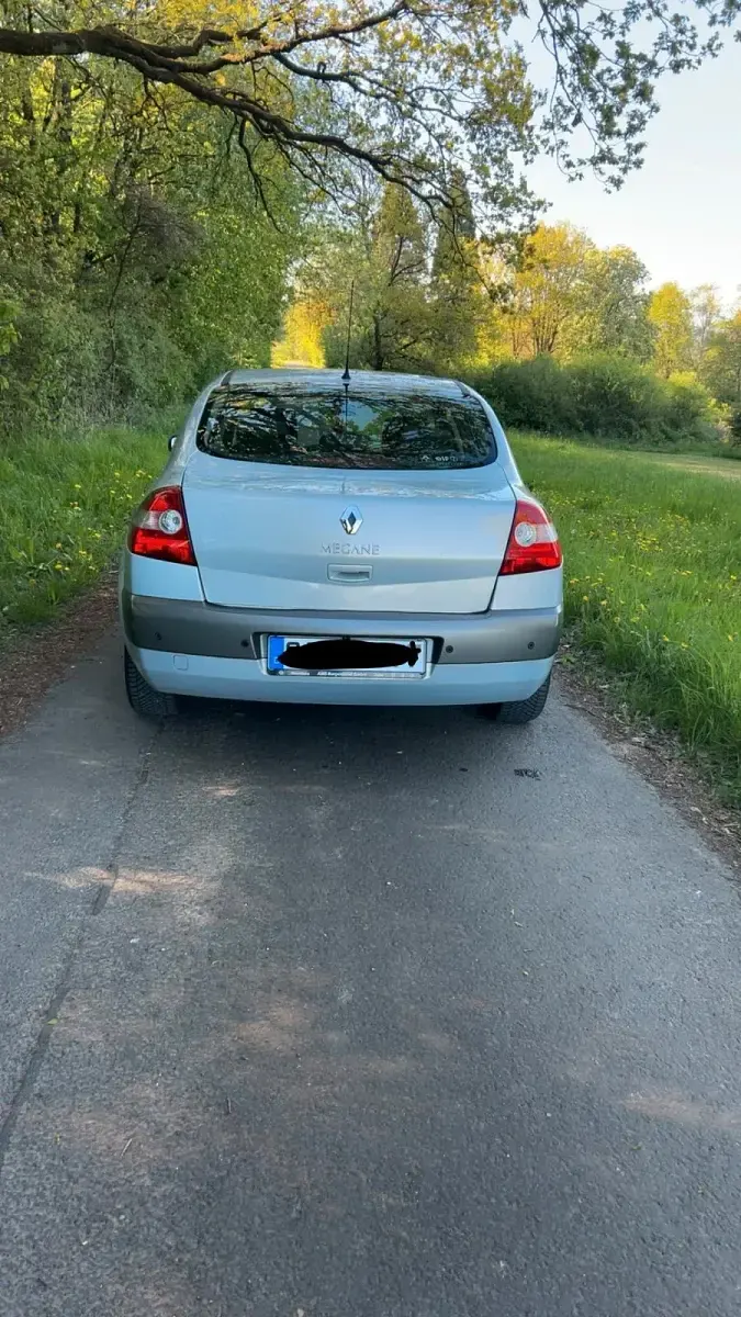 Używany Renault Mégane II 113 KM (83 kW) 2004 Srebrny Sedan/Limuzyna