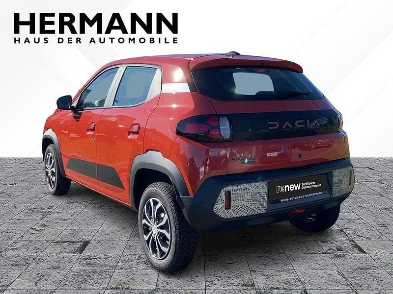 Gebraucht Dacia Spring Extreme 47 kW (65 PS) 2024 Brick red (rot) Kleinwagen
