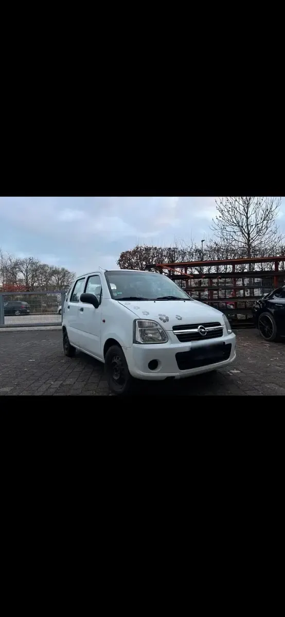 Używany Opel Agila 60 KM (44 kW) 2007 Biały Sedan/Limuzyna