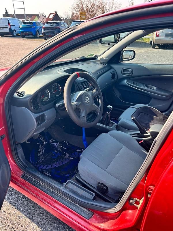 Gebraucht Nissan Almera 98 PS (72 kW) 2006 Rot Kleinwagen