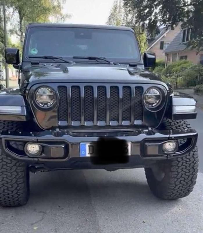 Gebraucht 2021 Jeep Wrangler Unlimited Sahara SUV | 69.999 € - Bild 1/4