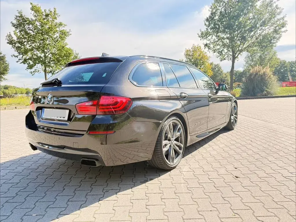Używany BMW M550 Performance 381 KM (280 kW) 2014 Czarny Sedan/Limuzyna