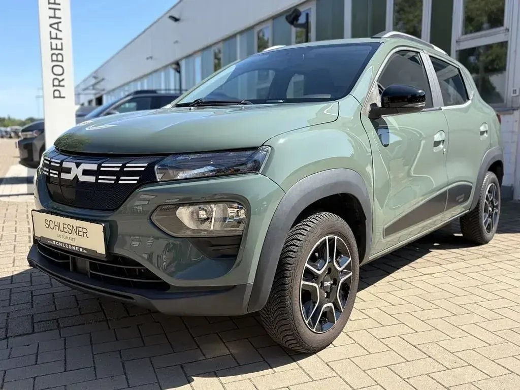 Gebraucht Dacia Spring Essentiel 33 kW (45 PS) 2023 Olivgrün Kleinwagen