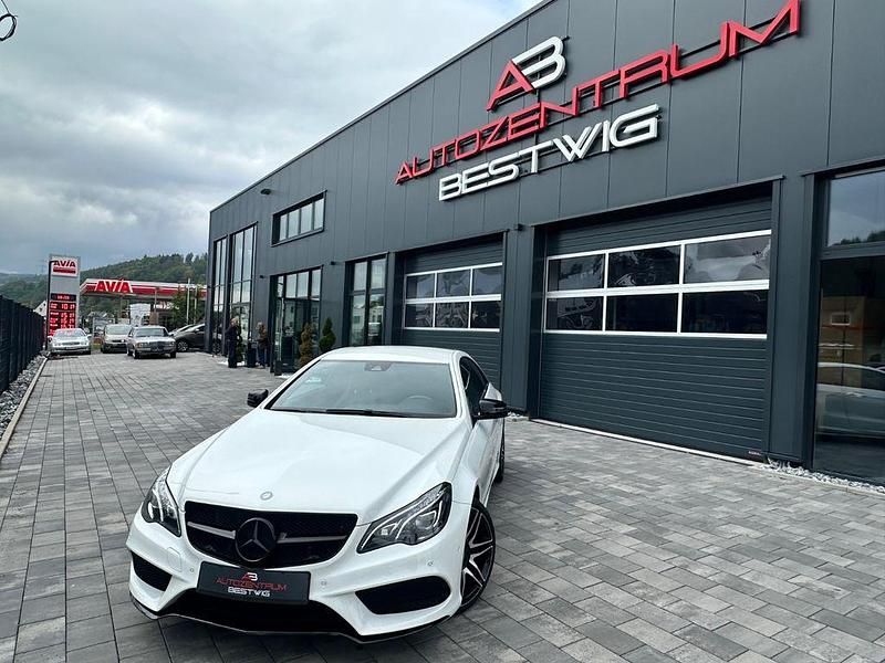 Weiß Gebraucht 2015 Mercedes E220 AMG line Coupé | 23.995 € - Bild 1/3