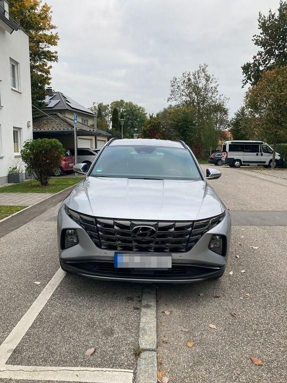 Grau Gebraucht 2023 Hyundai Tucson Edition 30+ SUV | 22.900 € (Superpreis) - Bild 1/4