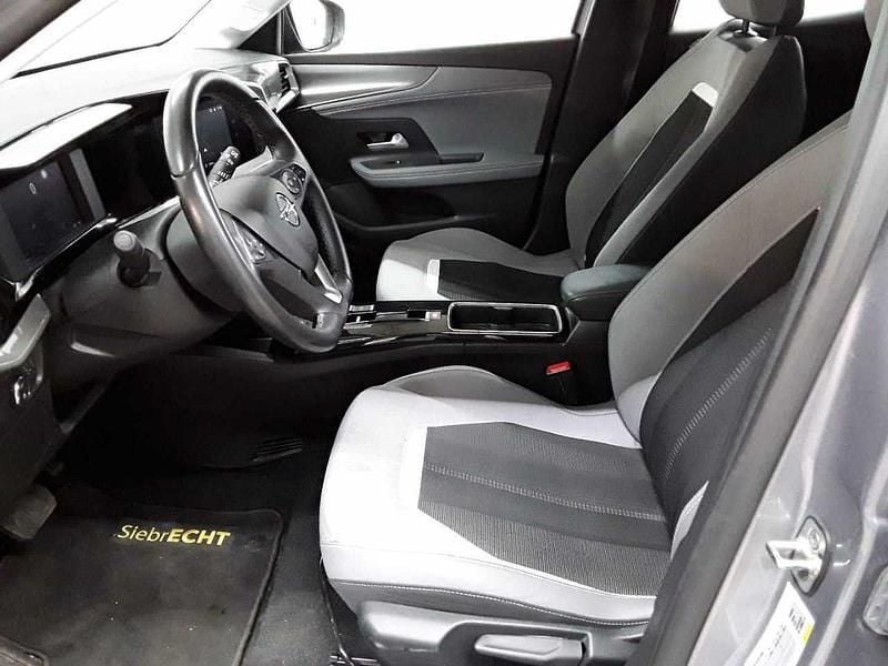 Gebraucht Opel Mokka-e Elegance 100 kW (136 PS) 2023 Quarz silber metallic SUV