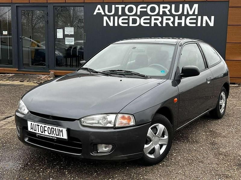 Grau Gebraucht 1997 Mitsubishi Colt Limousine | 800 € (Fairer Preis) - Bild 1/4