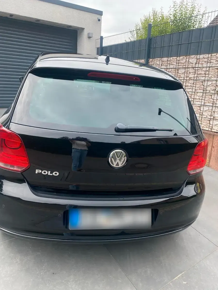 Gebraucht VW Polo Team 60 PS (44 kW) 2011 Schwarz Kleinwagen