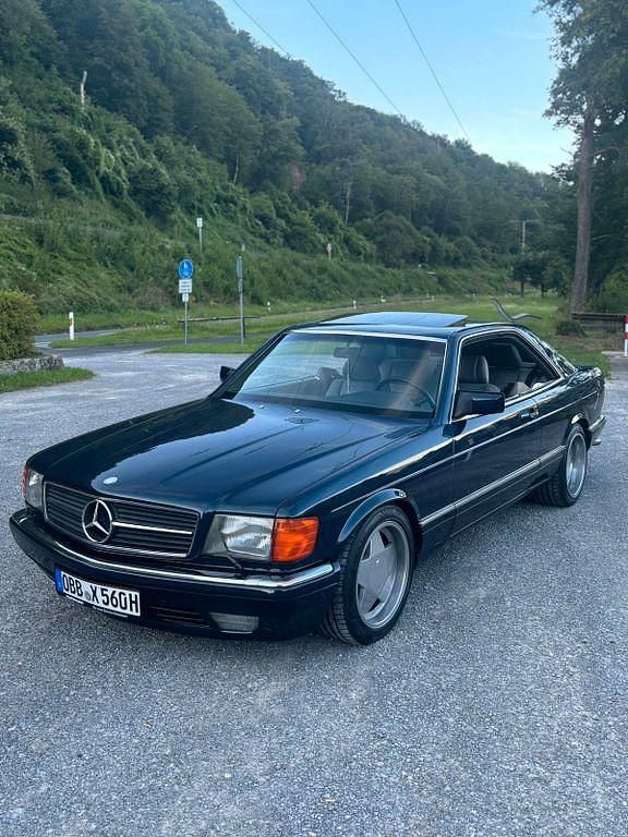 Blau Gebraucht 1987 Mercedes 560 Coupé | 22.999 € - Bild 1/4