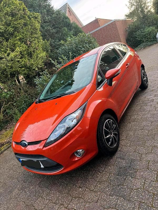 Orange Gebraucht 2012 Ford Fiesta Kleinwagen | 3.100 € (Guter Preis) - Bild 1/4