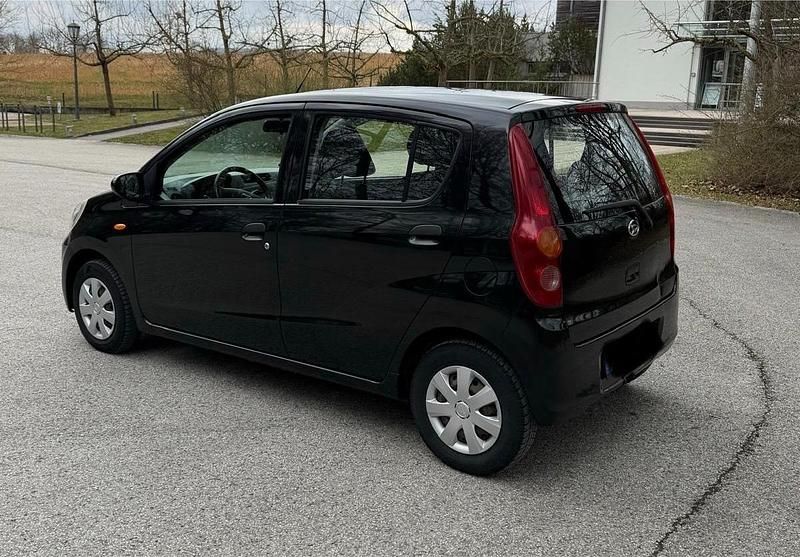 Gebraucht Daihatsu Cuore 69 PS (50 kW) 2008 Schwarz Kleinwagen