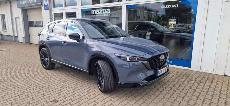 Polymetal grey Gebraucht 2023 Mazda CX-5 Homura-Line SUV | 33.990 € (Fairer Preis) - Bild 1/4