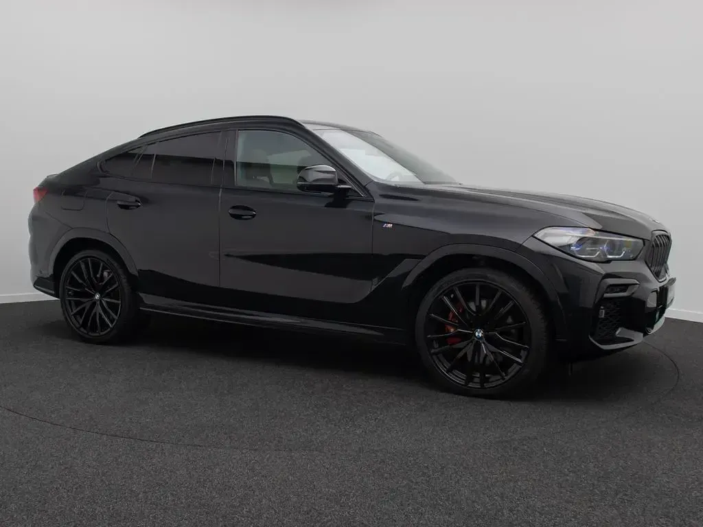 Gebraucht BMW X6 M50 Performance 530 PS (389 kW) 2023 Saphirschwarz  475braun SUV