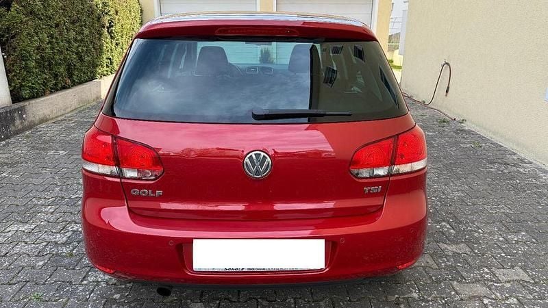 Gebraucht VW Golf VI Team 105 PS (77 kW) 2011 Orange Kleinwagen
