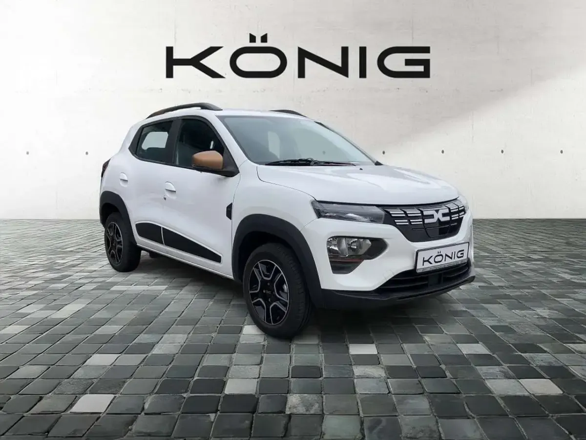 Gebraucht Dacia Spring Extreme 47 kW (65 PS) 2023 Kaolinweiß Kleinwagen