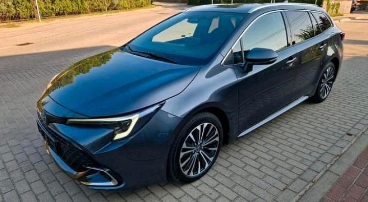Grau Gebraucht 2023 Toyota Corolla Hybrid Kombi | 23.500 € (Fairer Preis) - Bild 1/4