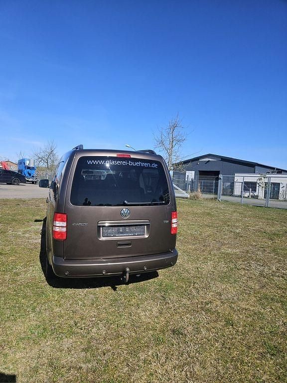 Używany VW Caddy Maxi 102 KM (75 kW) 2010 Brązowy Minivan