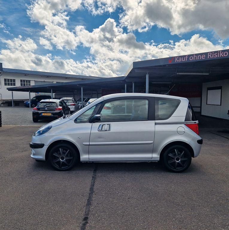 Gebraucht Peugeot 1007 Premium 109 PS (80 kW) 2008 Grau Van / Kleinbus