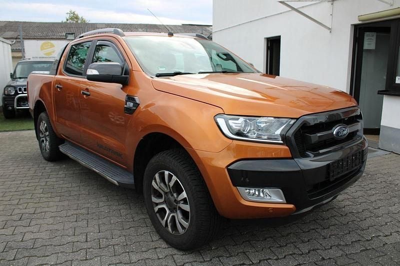 Orange (metallic) Gebraucht 2017 Ford Ranger Wildtrack Abholung | 21.999 € (Guter Preis) - Bild 1/4