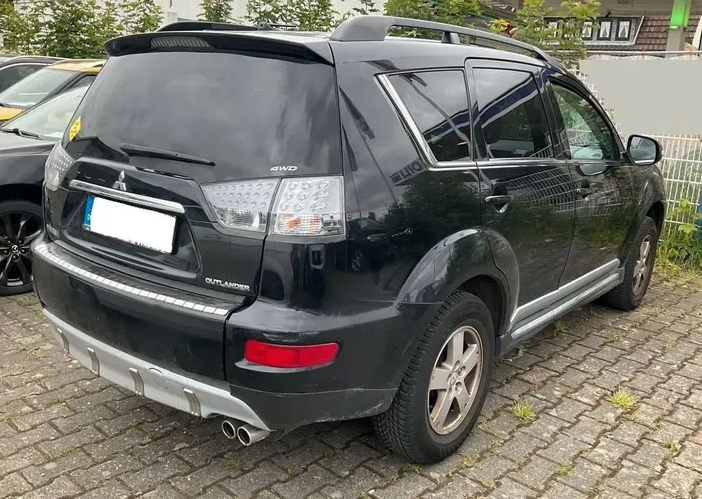 Gebraucht Mitsubishi Outlander 156 PS (114 kW) 2012 Schwarz SUV