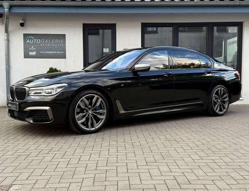 Black sapphire metallic Gebraucht 2017 BMW 760 Limousine | 42.480 € - Bild 1/4