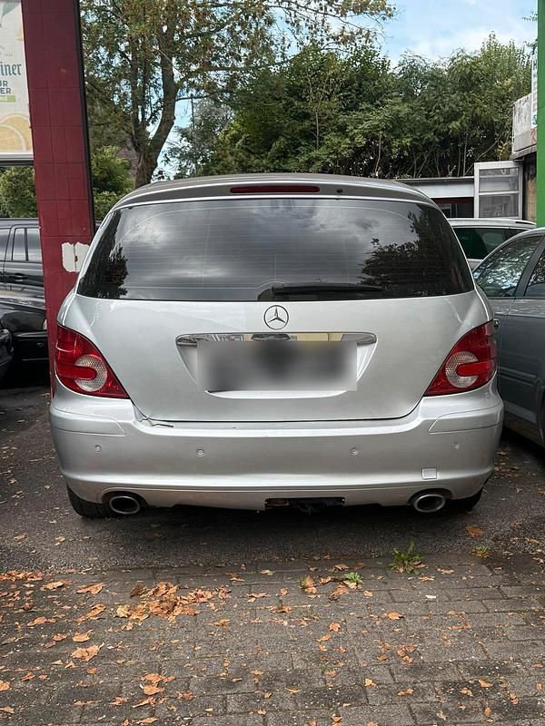 Silber Gebraucht 2006 Mercedes R350 Van / Kleinbus | 2.850 € (Fairer Preis) - Bild 1/4