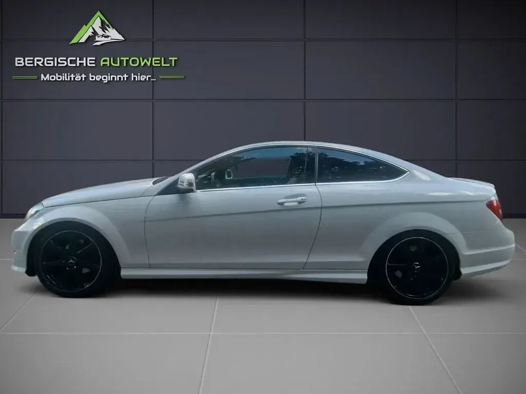 Gebraucht Mercedes C250 AMG line 204 PS (150 kW) 2012 Polarweiss Coupé