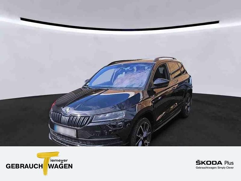 Schwarz Gebraucht 2022 Skoda Karoq SportLine SUV | 29.390 € (Fairer Preis) - Bild 1/4
