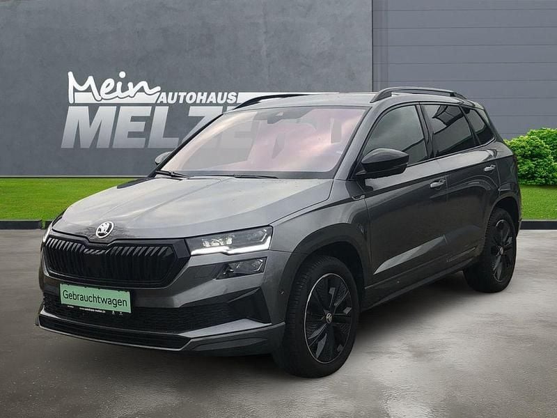 Grau Gebraucht 2024 Skoda Karoq SportLine SUV | 36.880 € (Fairer Preis) - Bild 1/4