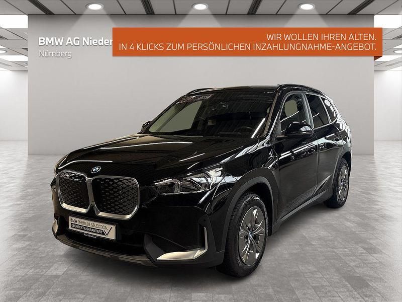Schwarz Gebraucht 2023 BMW iX1 Performance SUV | 42.990 € (Teuer) - Bild 1/4