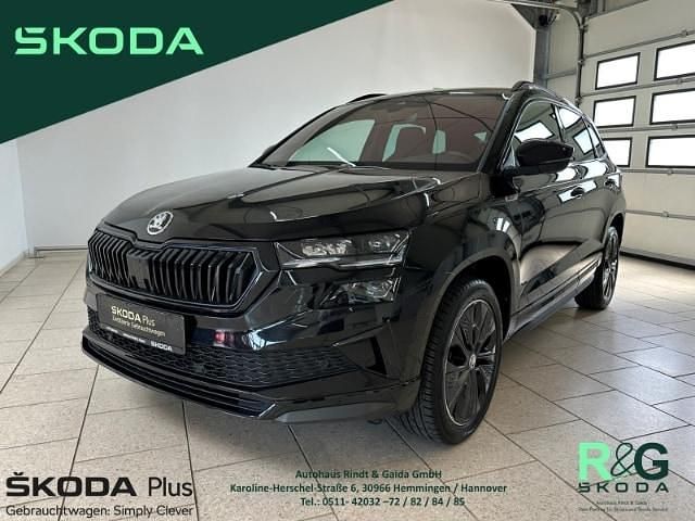 Schwarz Gebraucht 2023 Skoda Karoq SportLine SUV | 34.499 € (Teuer) - Bild 1/4