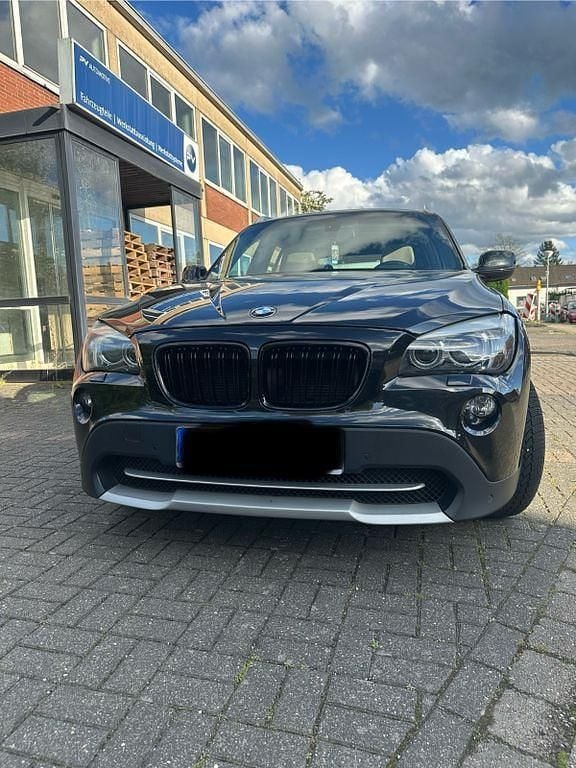 Second-hand BMW X1 204 CP (150 kW) 2009 Negru SUV