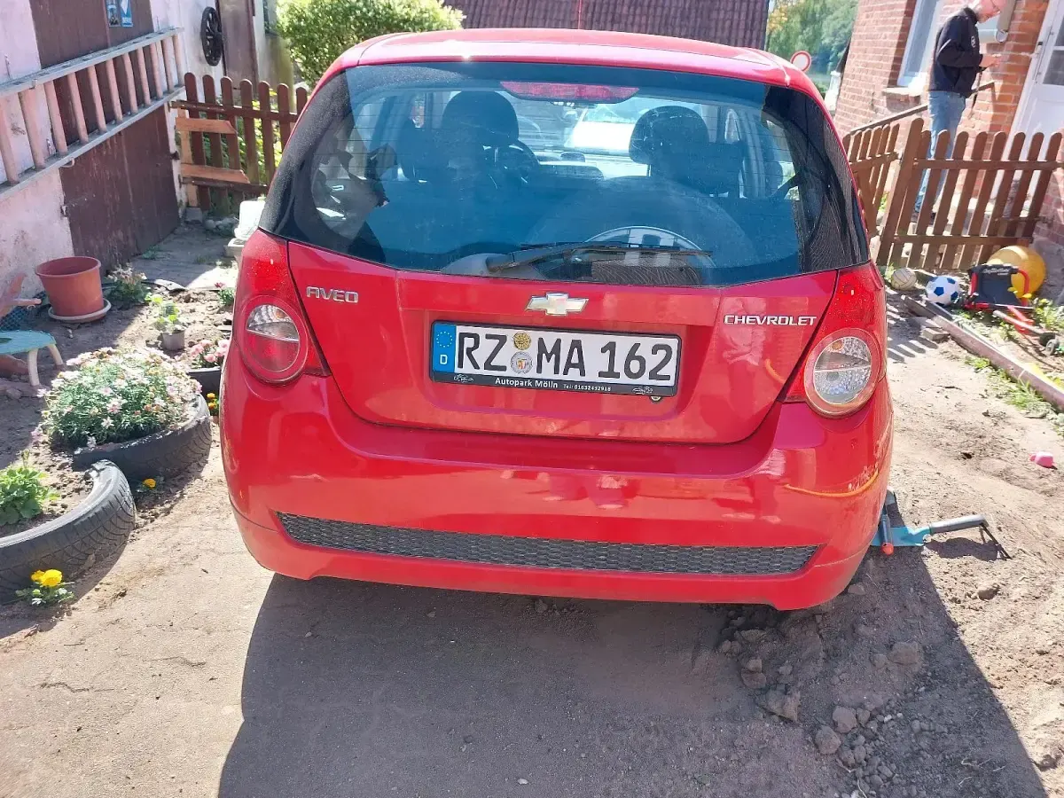 Gebraucht Chevrolet Aveo 2011 Rot Kleinwagen