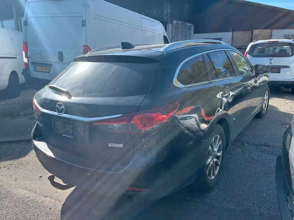 Używany Mazda 6 Prime-Line 150 KM (110 kW) 2014 Czarny Sedan/Limuzyna